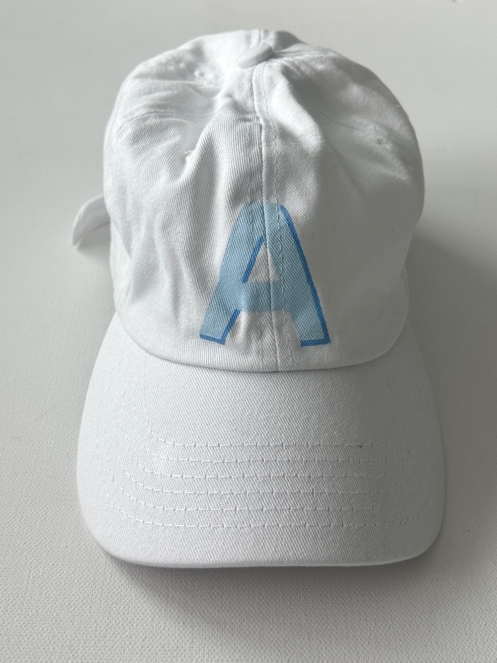 Cap women’s white with Blue 'A' Accent.